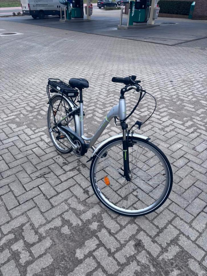 Elecktrische fiets, Fietsen en Brommers, Elektrische fietsen, Zo goed als nieuw, 50 km per accu of meer, Ophalen