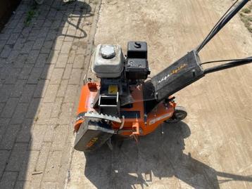 Gazonafboorder + plaatser bergenzingsdraad beschikbaar voor biedingen