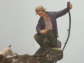 Statuete d’un pêcheur en céramique 