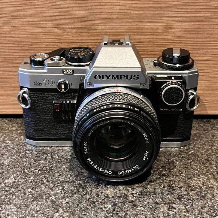 Olympus OM10 analog camera + lenzen en accessoires in koffer, Audio, Tv en Foto, Fotocamera's Analoog, Gebruikt, Spiegelreflex