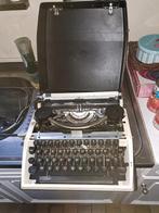 Adler typemachine in zijn koffer, Gebruikt