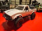 Toyota Hi-lux pick-up 1/16 RC auto, Hobby en Vrije tijd, Elektro, Auto offroad, Ophalen of Verzenden, Zo goed als nieuw