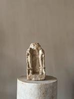 Fragment in kalksteen, Ophalen