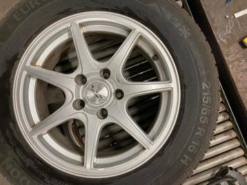 4 zilveren aluminium velgen met winterbanden (16') beschikbaar voor biedingen