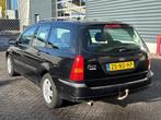 Ford Focus Wagon 1.6-16V Trend, airco, trekhaak, Auto's, Gebruikt, 4 cilinders, Zwart, 1080 kg