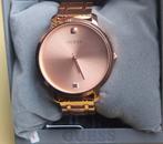 Montre pour femme, marque Guess portée 1fois.bon état