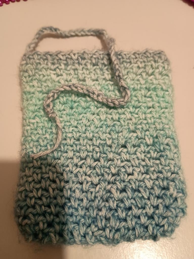 Klein gehaakt zakje, Enlèvement