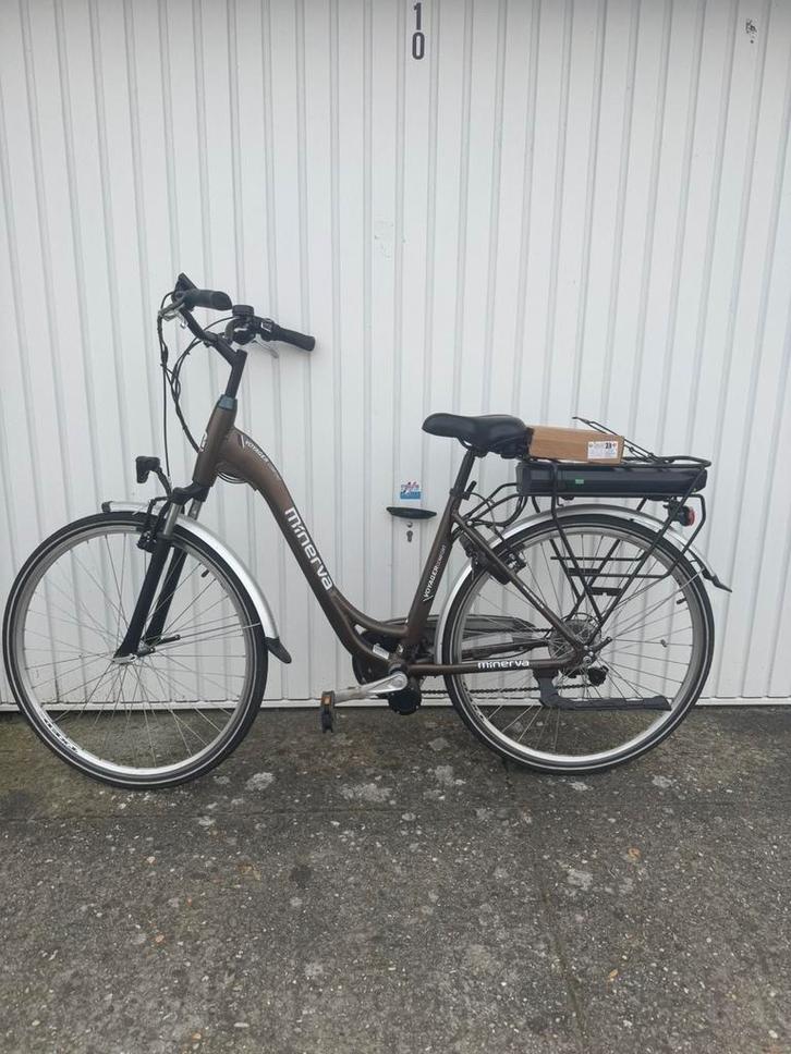 MINERVA ELEKTRISCHE FIETS MET MIDDENMOTOR, Fietsen en Brommers, Elektrische fietsen, Zo goed als nieuw, Ophalen