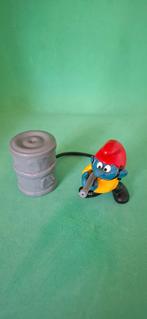Brandweer smurf met rode muts en gele jas, Collections, Schtroumpfs, Enlèvement ou Envoi, Comme neuf, Autres Schtroumpfs, Poupée, Figurine ou Peluche