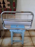 Oude papierrolhouder, Ophalen