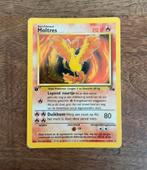 Pokémon Moltres 12/62 - First Edition - Holo Fossil - ned, Hobby en Vrije tijd, Verzamelkaartspellen | Pokémon, Ophalen of Verzenden
