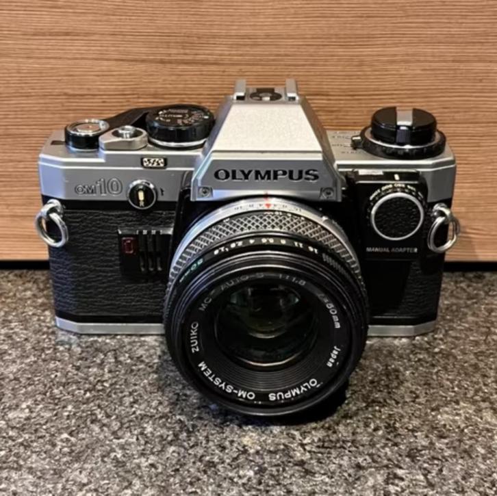 Olympus OM10 analoge camera + lenzen + accessoires, Audio, Tv en Foto, Fotocamera's Analoog, Gebruikt, Spiegelreflex, Olympus