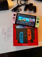Nintendo switch oled-garantie, Games en Spelcomputers, Spelcomputers | Nintendo Switch, Met games, Met 2 controllers, Zo goed als nieuw