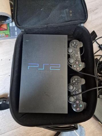 Playstation 2 inclusief 10 spelletjes beschikbaar voor biedingen