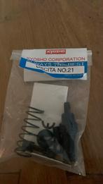 Kyosho nieuw onderdeeltje nr 21. Voor modelbouw 1:10. 6€, Hobby en Vrije tijd, Ophalen, Nieuw, Nitro