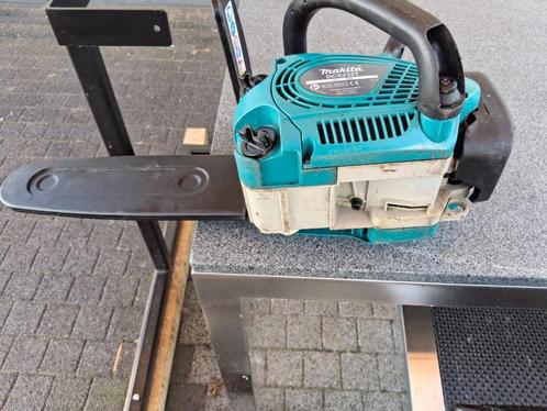 Makita Kettingzaag top handle., Doe-het-zelf en Bouw, Gereedschap | Zaagmachines, Zo goed als nieuw, Kettingzaag, 600 tot 1200 watt