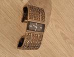 Horloge DKNY met bruine steentjes., Verzenden, Zo goed als nieuw, DKNY