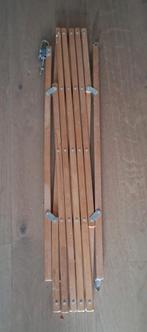 Veiligheidshek hout voor kindjes, Ophalen