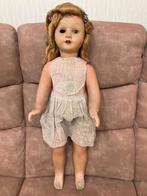 antieke pop met loopmechanisme om te restaureren, Ophalen