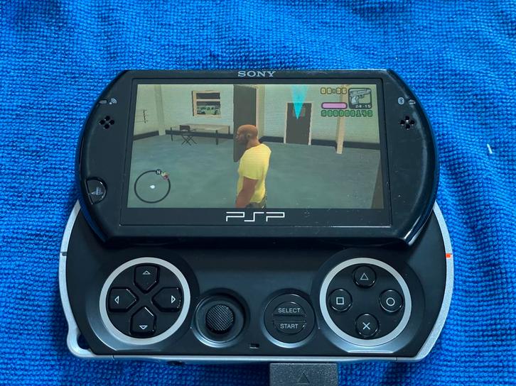 PSP Go Origineel, Games en Spelcomputers, Spelcomputers | Sony PSP, Gebruikt, PSP, Zwart, Met games, Ophalen of Verzenden