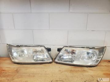 Dodge Journey / Fiat Freemont koplamp links en rechts €100st beschikbaar voor biedingen