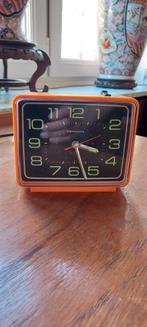 Retro wekker in nieuwstaat, Ophalen