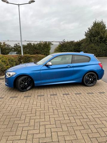 Bmw M135i vollewig origineel met lsd open dak awd beschikbaar voor biedingen