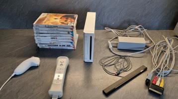 Nintendo Wii met remote, nunchuk en 9 games