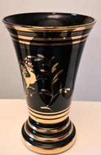 Booms glas: vaas, Ophalen