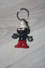 Oude sleutelhanger zwarte Smurf , Milkana ( 4 cm ) plastic, Verzamelen, Smurfen, Ophalen of Verzenden, Gebruikt, Overige Smurfen