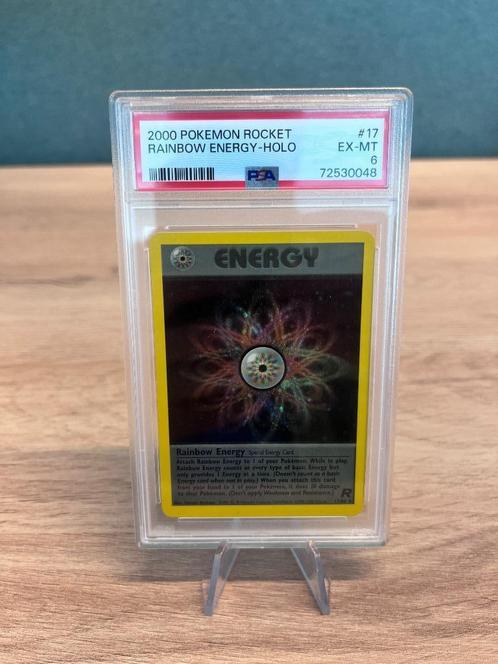 Rainbow Energy Holo PSA 6 - 17/82 - Team Rocket, Hobby & Loisirs créatifs, Jeux de cartes à collectionner | Pokémon, Comme neuf