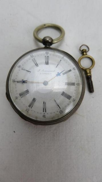 zakhorloge J.Jeancart à Louvain, met sleutel  beschikbaar voor biedingen