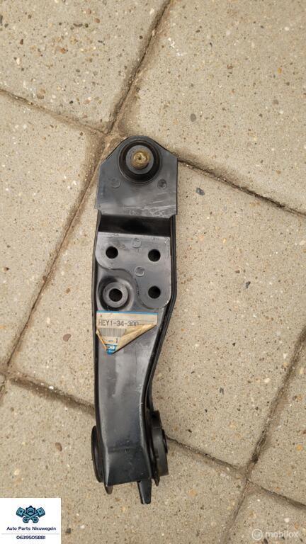 Draagarm rechtsvoor  Mazda 929 ('88-'91) HEY1-34-300A, Auto-onderdelen, Ophanging en Onderstel, Mazda, Nieuw, Ophalen of Verzenden