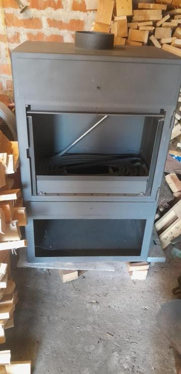 DDG houtkachel cv F40S 35kW beschikbaar voor biedingen
