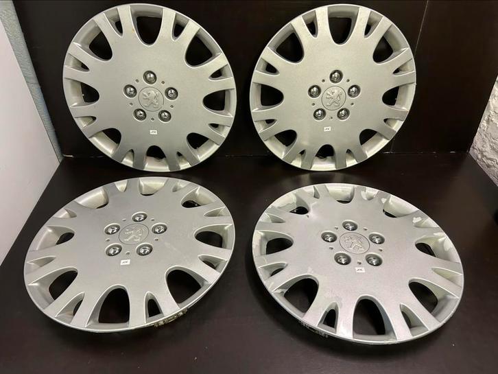 4 wieldoppen Peugeot 207,208,307,308,2008, partner 16", Auto diversen, Wieldoppen, Gebruikt, Ophalen of Verzenden