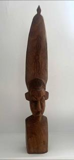 Afrikaans houten beeld, Ophalen