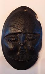 Afrikaans maskertje in zeepsteen, Ophalen