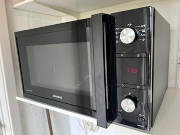 Samsung. Combi magnetron oven beschikbaar voor biedingen