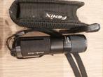 Fenix PD20 zaklamp., Ophalen