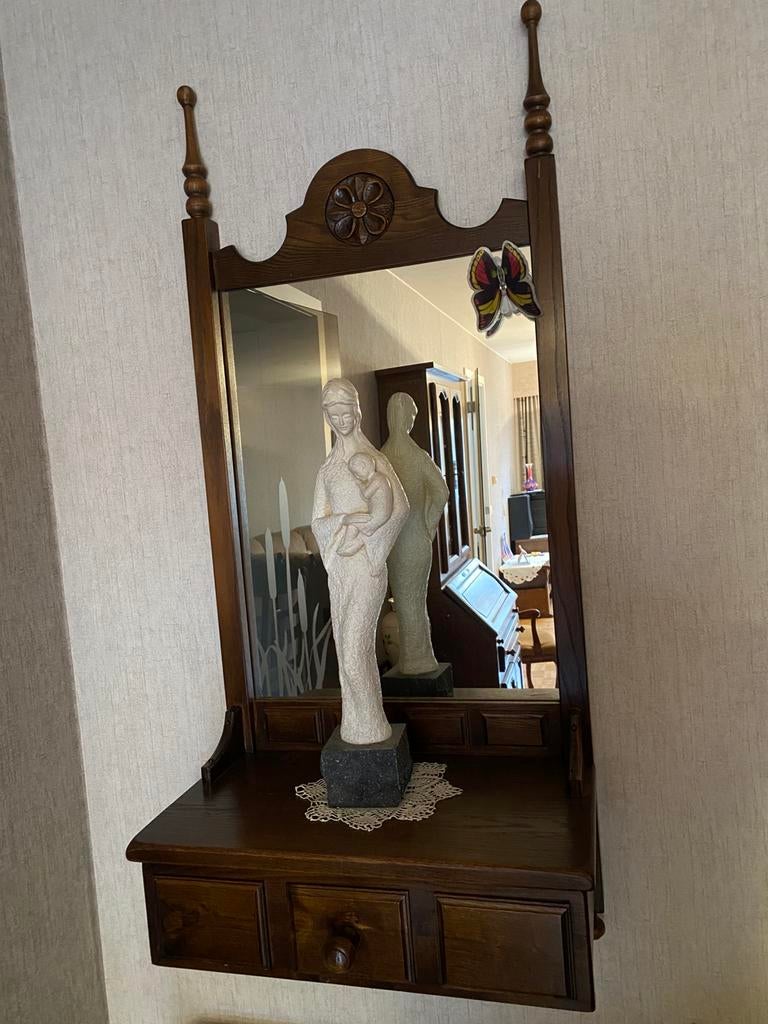 Ophangspiegel met lade, Ophalen