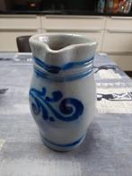 Potten en kannen met blauwe motieven, Ophalen