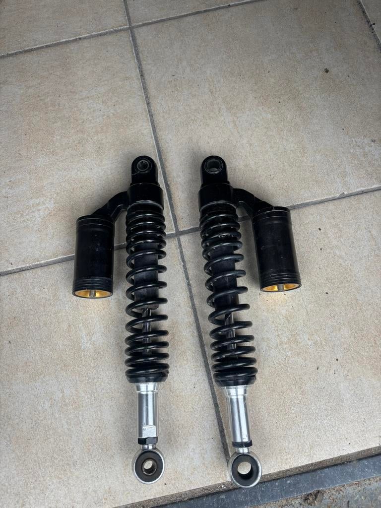 Achterveren dax/monkey op luchtdruk, Ophalen