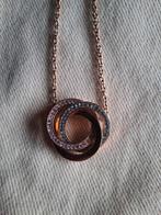 Rozegouden ketting, Ophalen