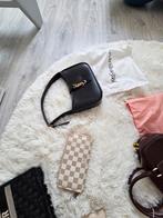 Sac yves saint laurent, Enlèvement