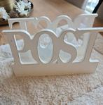 Houten kranten houder, Enlèvement