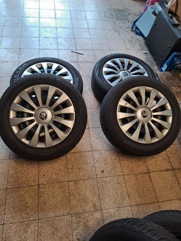 4 wielen met zomerbanden en 4 winter banden 185/60 R 17