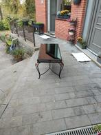 Een smeedijzeren tafel, Ophalen, Gebruikt