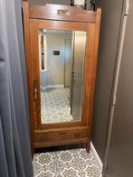 Houten kast met spiegel, Ophalen
