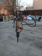 Breekhamer minigraver, Enlèvement