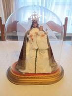 Mariabeeld onder stolp, Ophalen